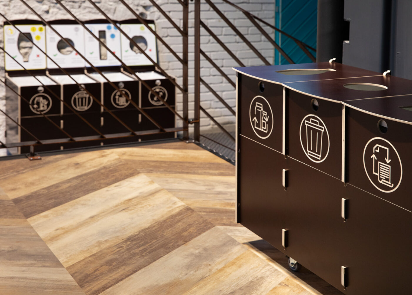 Recycling bins for shared office zones placed in common areas to support consistent recycling.