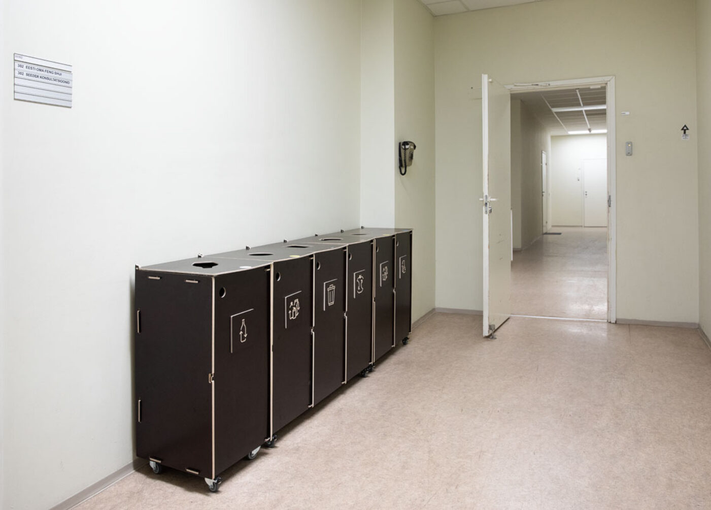 Recycling bins with leak-proof bottoms supporting clean waste sorting.