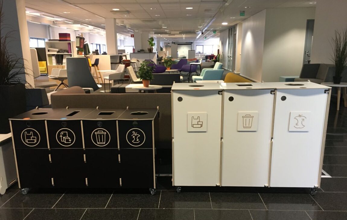 Waste bins for business centres positioned in shared areas to support clear waste sorting.