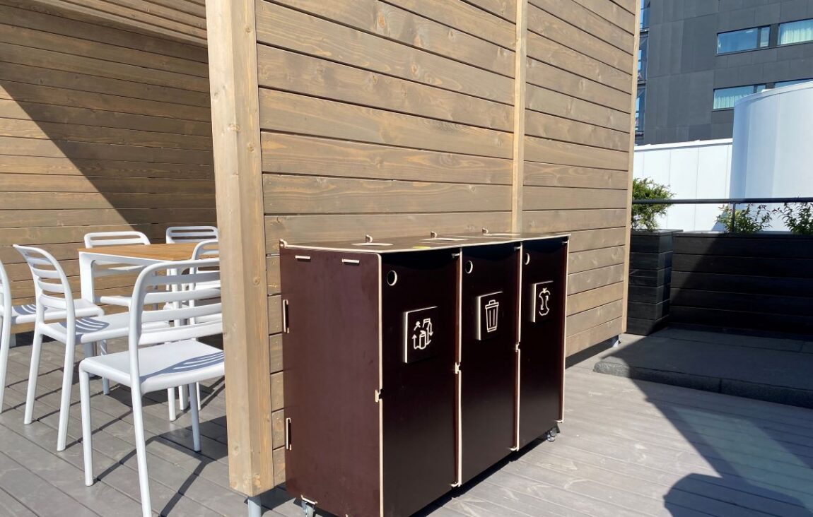 Eco-friendly recycling bins designed for responsible waste sorting.